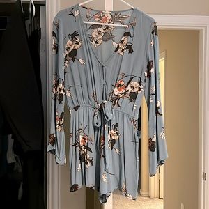 Floral Romper size L. Blue with flowers. Elastic waste bell sleeves.